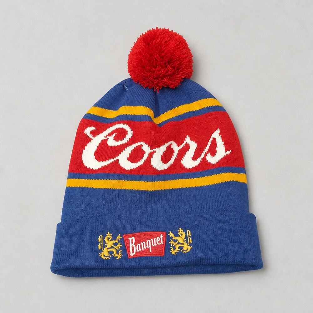 Coors Banquet Beer Knit Cuff Beanie Hat Pom Pom Blue Red Yellow Mad Engine NWT